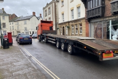 Low loader passing through The Square (Nov 2021)